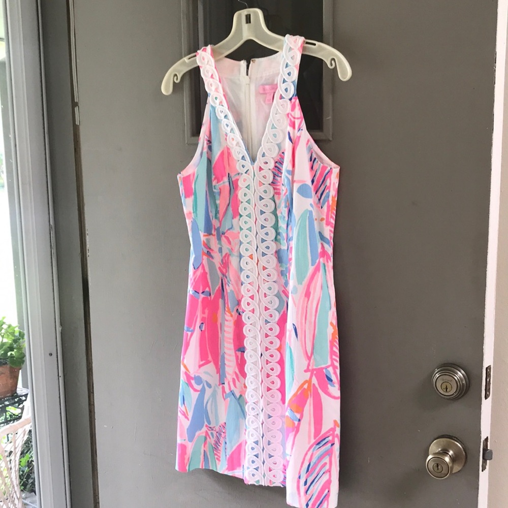 Darling light colored sail print “out to sea”.